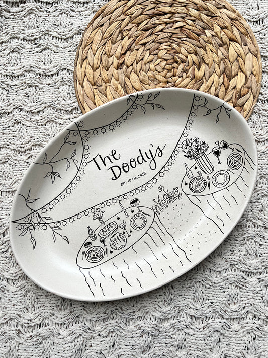 Decorative ceramic tray with artistic design on a textured surface