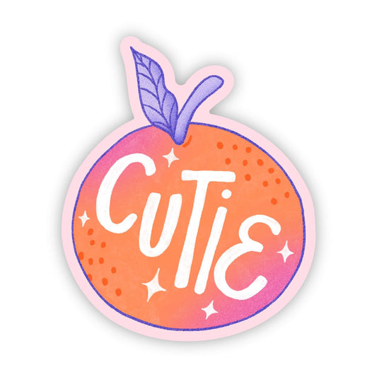 Sticker with 'Cutie' text on an orange background with a purple leaf