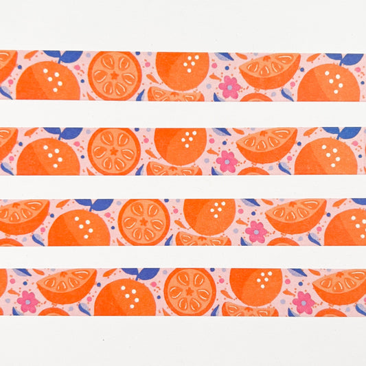 Pattern of orange slices and flowers on a white background