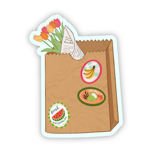 Sticker of an illustration of a brown paper bag with stickers featuring fruits and flowers on a white background