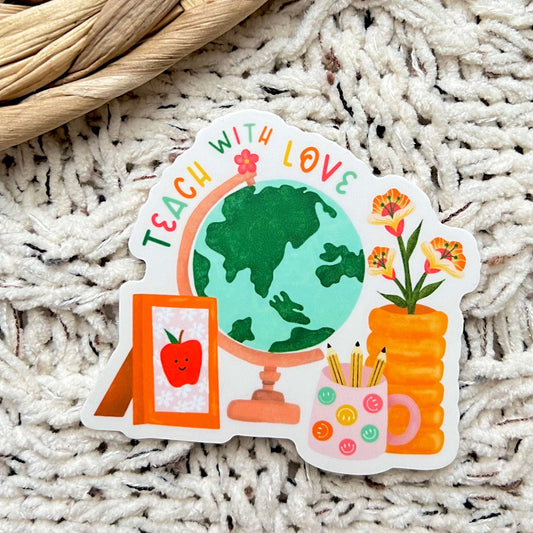 Sticker with a globe, flowers, and educational elements on a textured surface