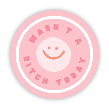 Pink circular sticker with a smiley face and text on a white background