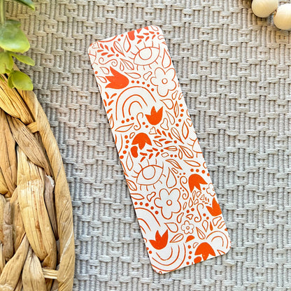 Bookmark with floral pattern on a textured surface
