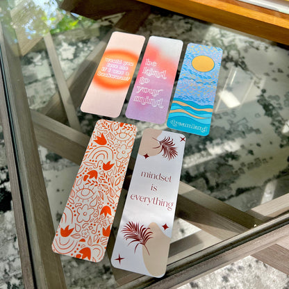 Colorful bookmarks on a glass surface with a blurred background