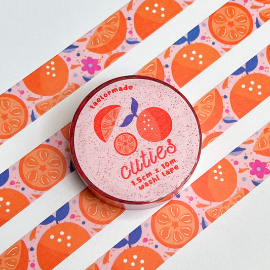Washi tape with a colorful design featuring oranges 