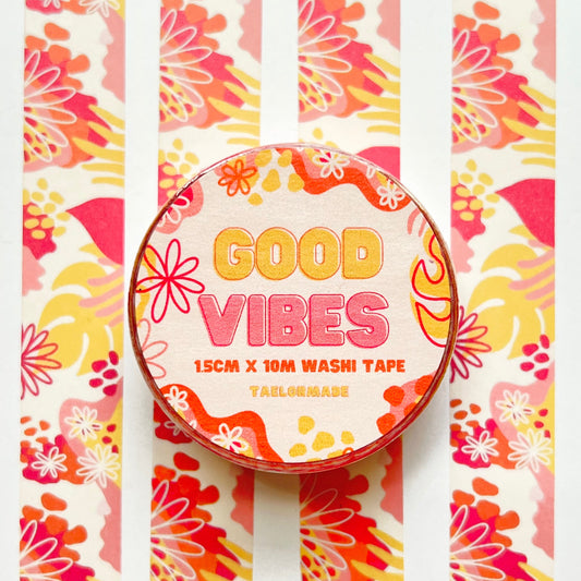 Decorative washi tape with 'Good Vibes' text on a colorful patterned background