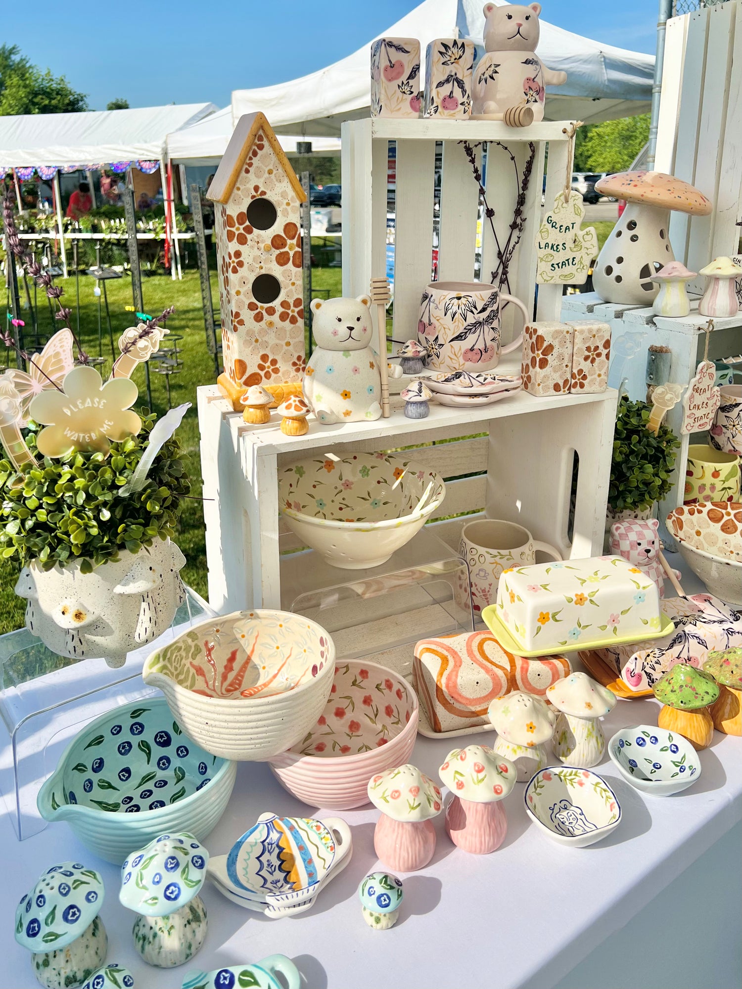 Table with ceramic items at an outdoor market