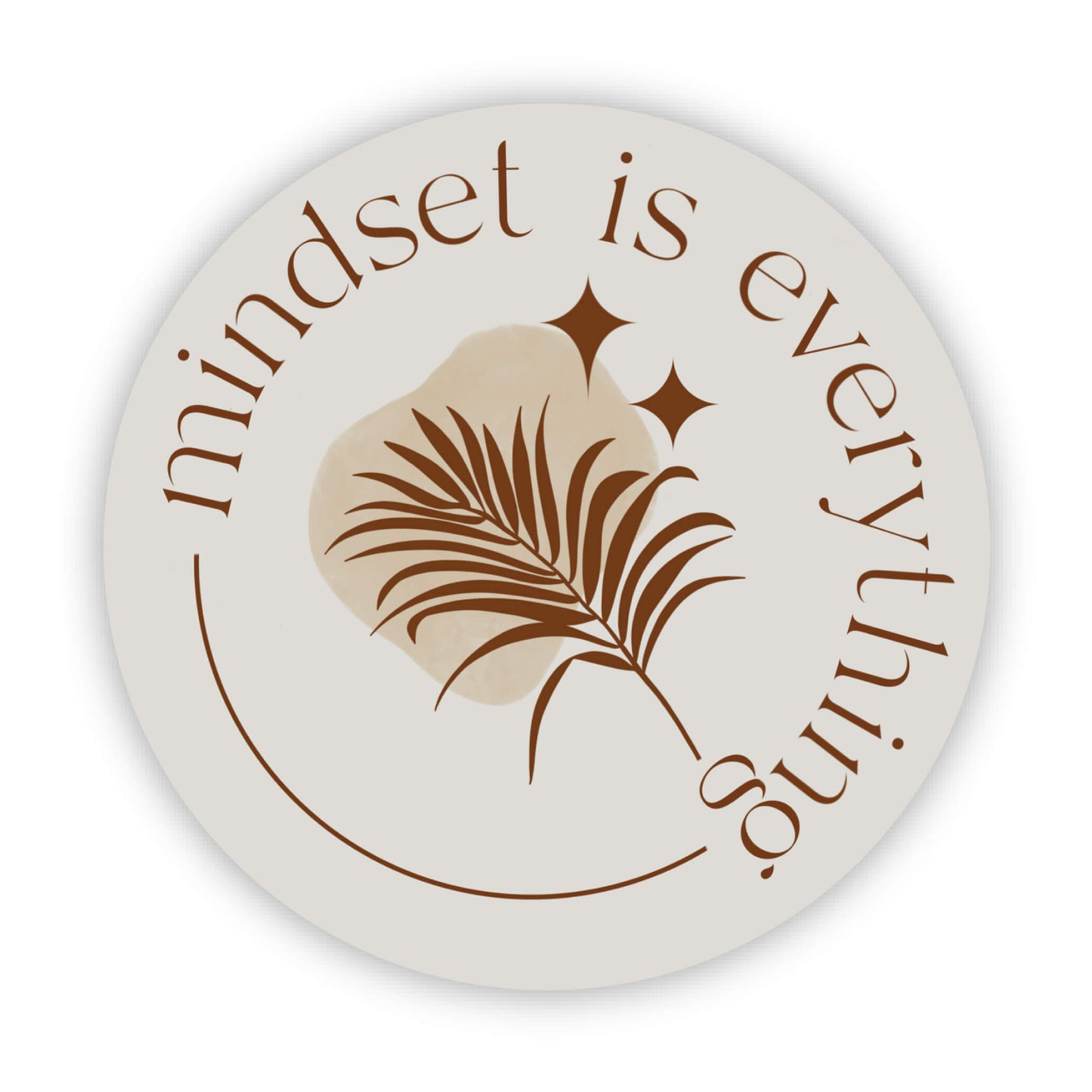 Round sticker with brown leave illustration and 'mindset is everything' text on a white background