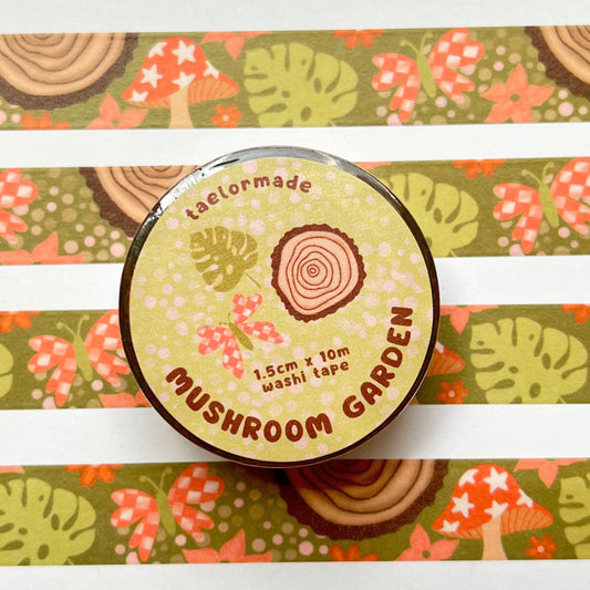 Mushroom Garden washi tape on a colorful striped background