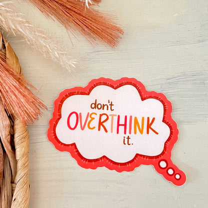 Speech bubble sticker with 'don't overthink it.' text on a light background