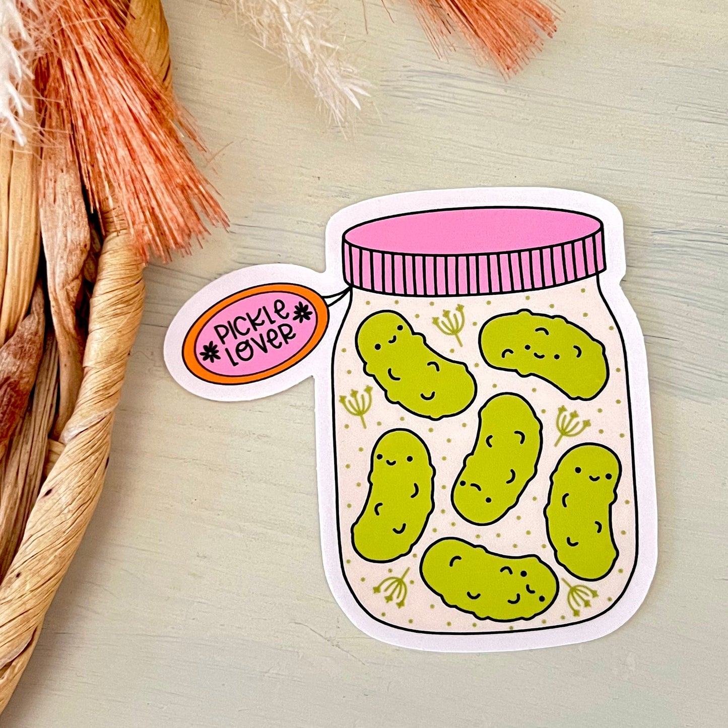 Sticker of a jar with pickles and 'Pickle Lover' label on a light background