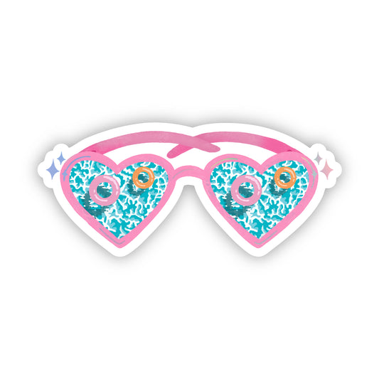 Heart-shaped sunglasses sticker with pink frame and blue patterned lenses on a white background