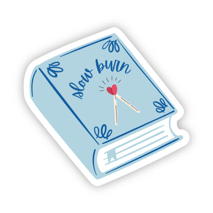 Sticker of a book with 'slow burn' text and matches on a light blue background