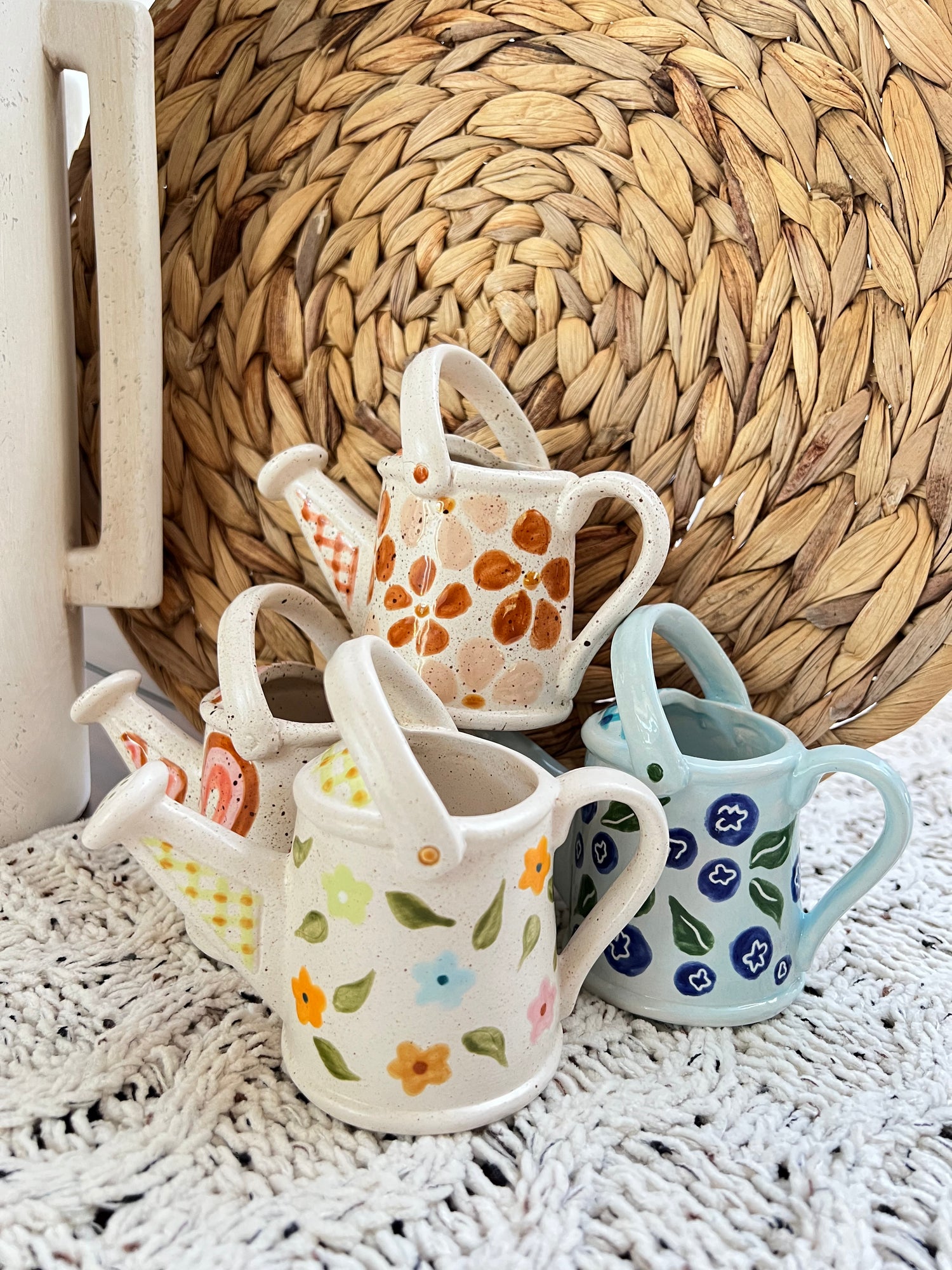 ceramic hand painted watering can shaped planters with floral designs